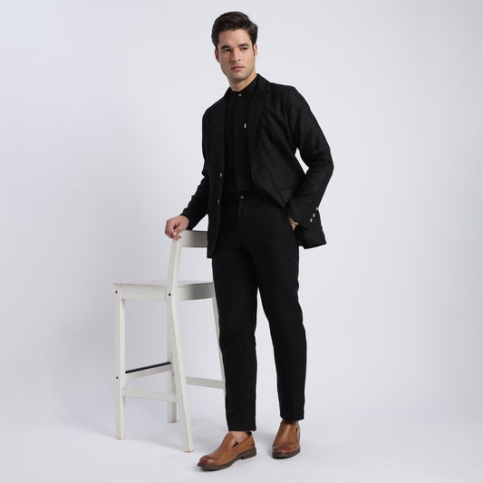 Tailored men’s black linen blazer designed for warm-weather wear
