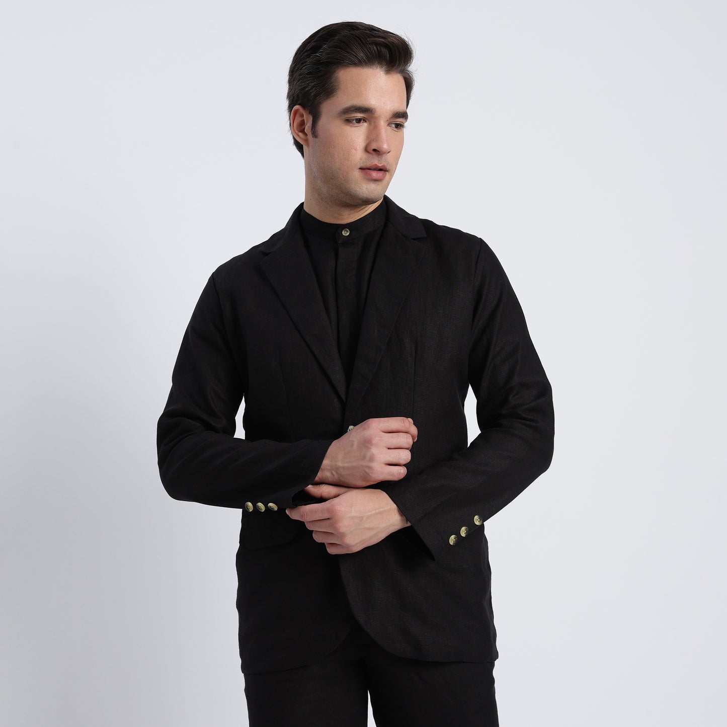 Men’s black linen blazer suitable for formal and smart-casual styling