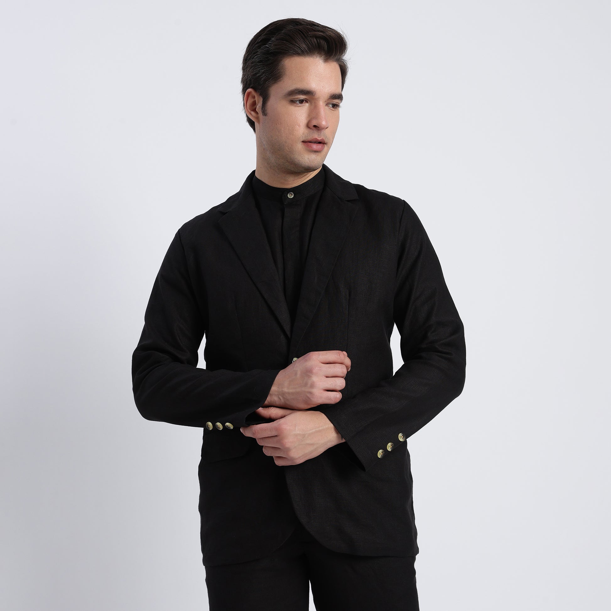 Men’s black linen blazer suitable for formal and smart-casual styling